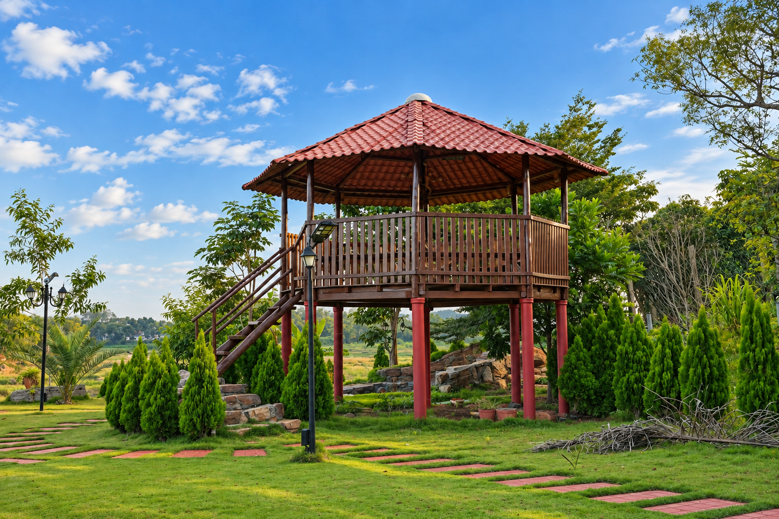 A red-roofed treetop gazebo above the gardens