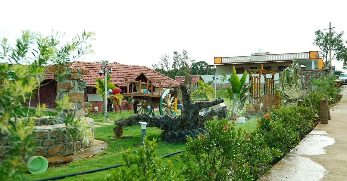 Stone cottages and gardens at Vintage Farms in soft daylight
